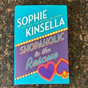 Sophie Kinsella - Shopaholic to the Rescue (Teal & Purple Cover) Hardcover